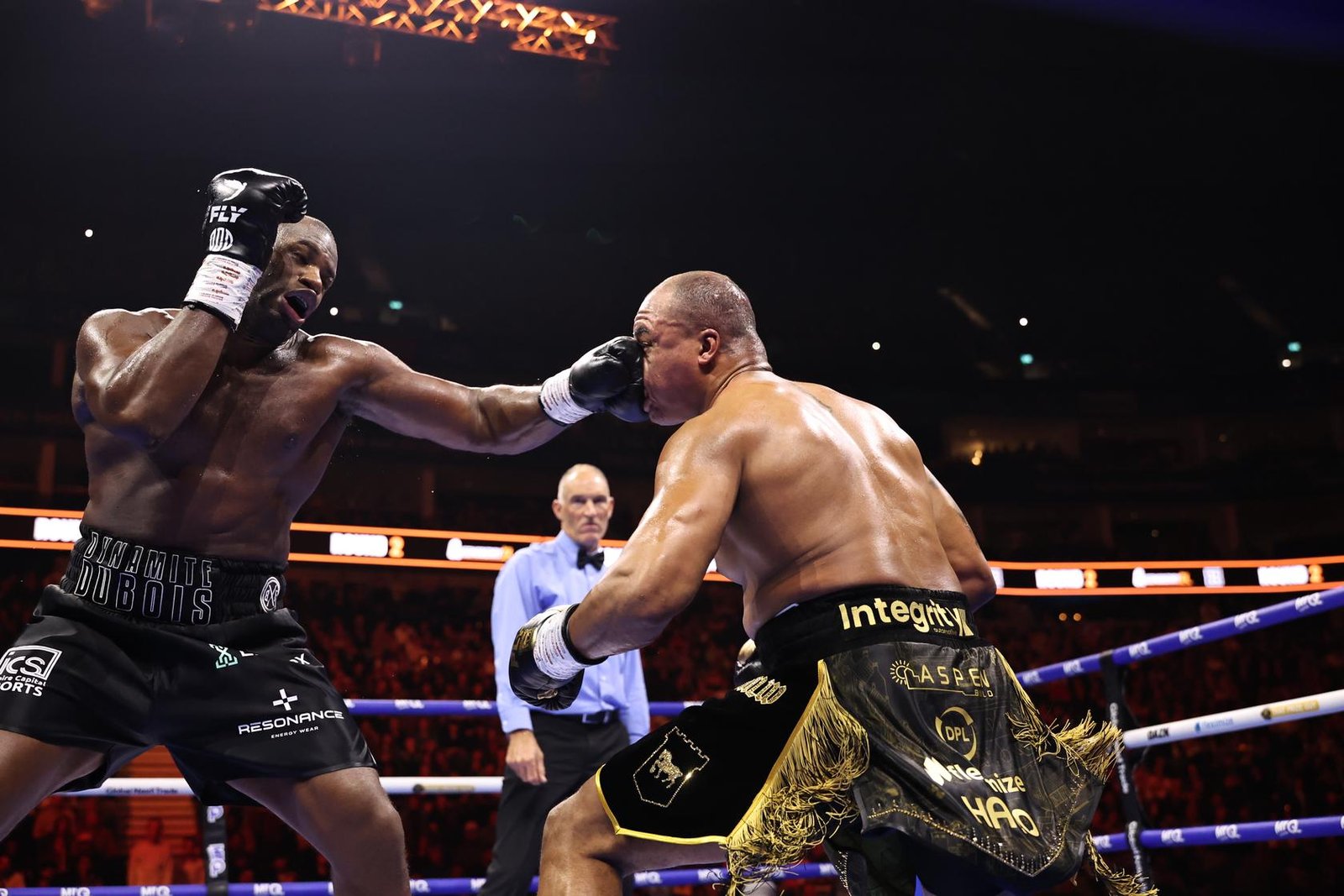 Daniel Dubois lands a left hand against Fabio Wardley in their London title rematch.