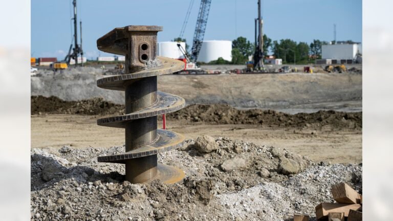 An auger stands in the foreground at the Browns’ new Huntington Bank Field construction site in Brook Park on July 24, 2026.