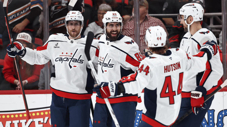 Alex Tuch celebrates with Capitals teammates during Washington’s October 2, 2026 game at Carolina.