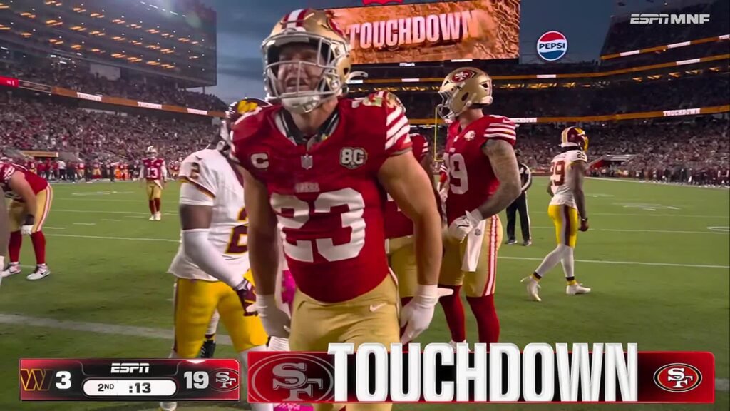Christian McCaffrey celebrates his second rushing touchdown against Washington at Levi’s Stadium.