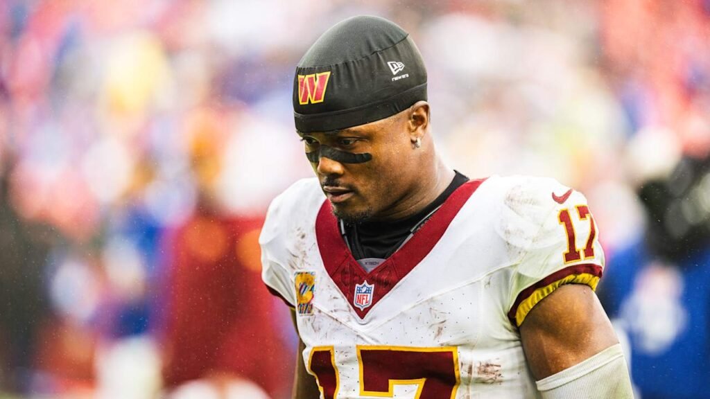 Terry McLaurin wears a Washington Commanders cap and No. 17 jersey.