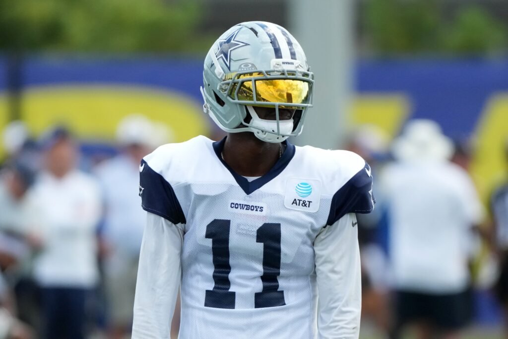 Marquez Valdes-Scantling wears a Dallas Cowboys practice jersey and helmet during an August 2026 joint practice.