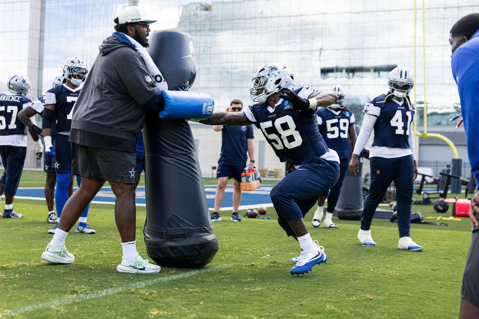 Cowboys defenders work through a practice drill on October 14, 2026.