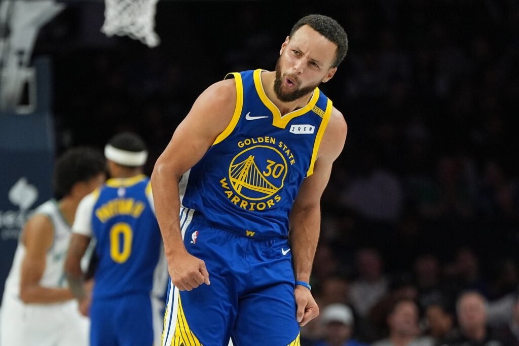 Stephen Curry celebrates during Golden State’s October 28, 2026 game against Minnesota at Target Center.