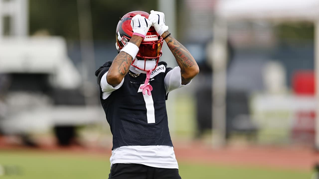 Tank Dell wearing No. 1 at Texans practice on October 21, 2026.