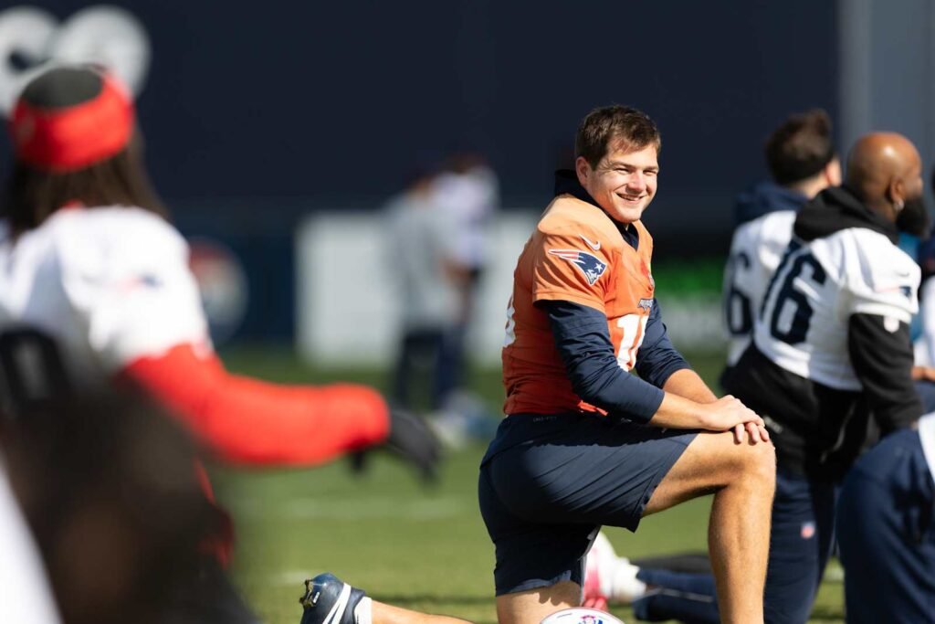 Drake Maye stretching at Patriots practice on October 21, 2026