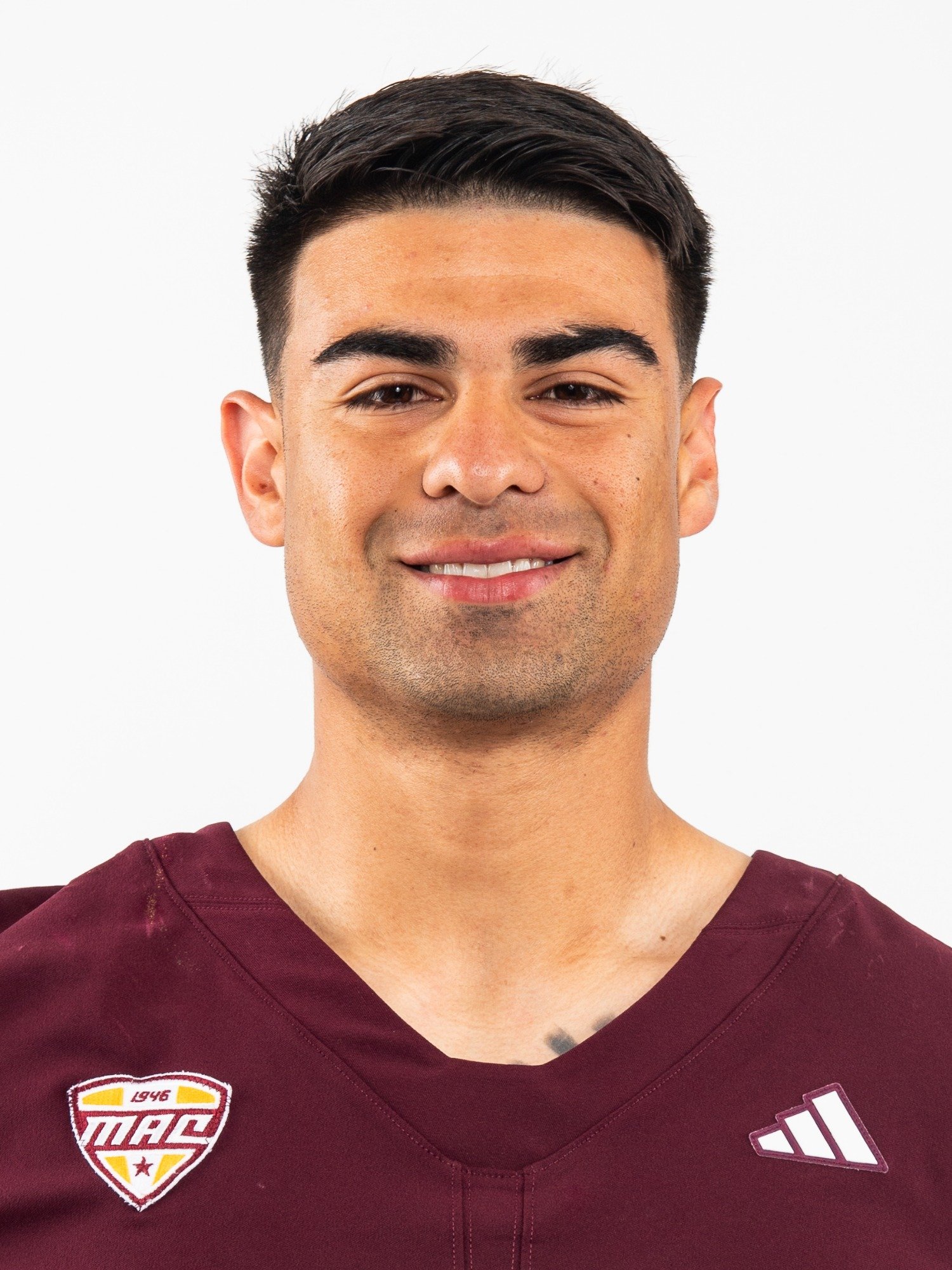 Angel Flores wearing a maroon Central Michigan jersey.
