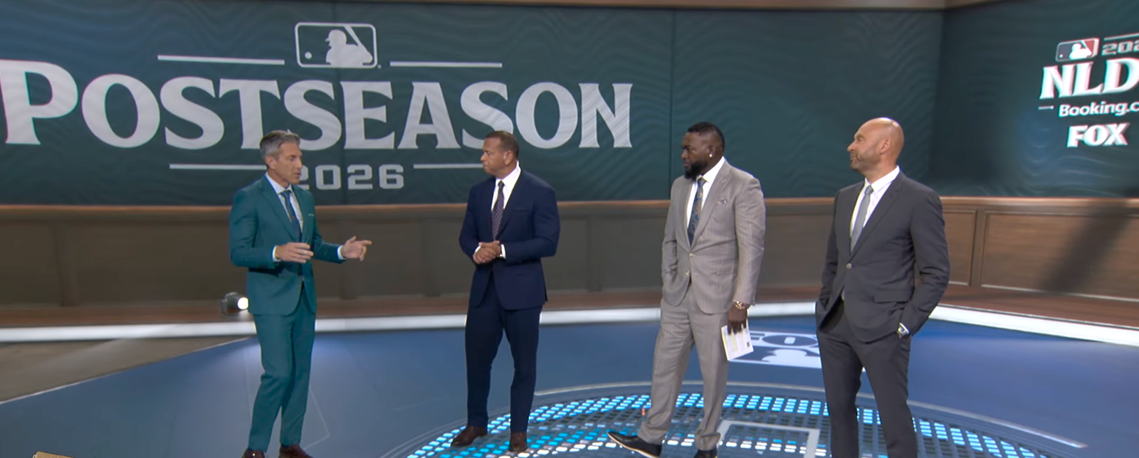 Alex Rodriguez, David Ortiz and Derek Jeter stand with the FOX Sports host on the postseason studio set.