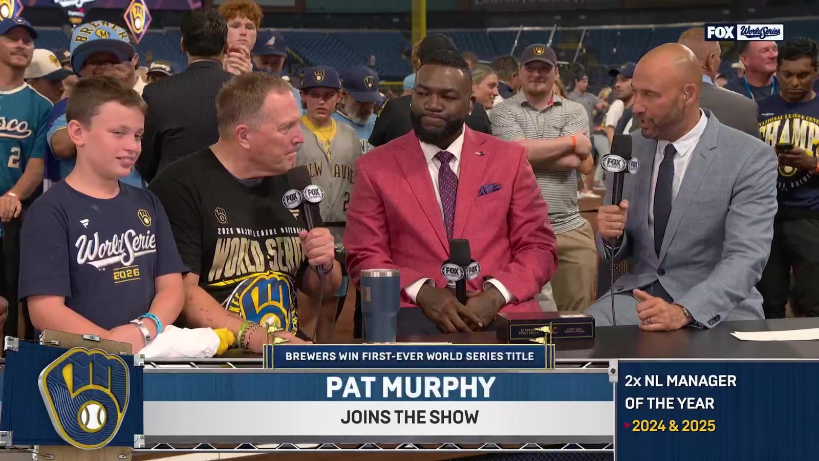 Pat Murphy with David Ortiz and Derek Jeter at FOX’s postgame broadcast desk.