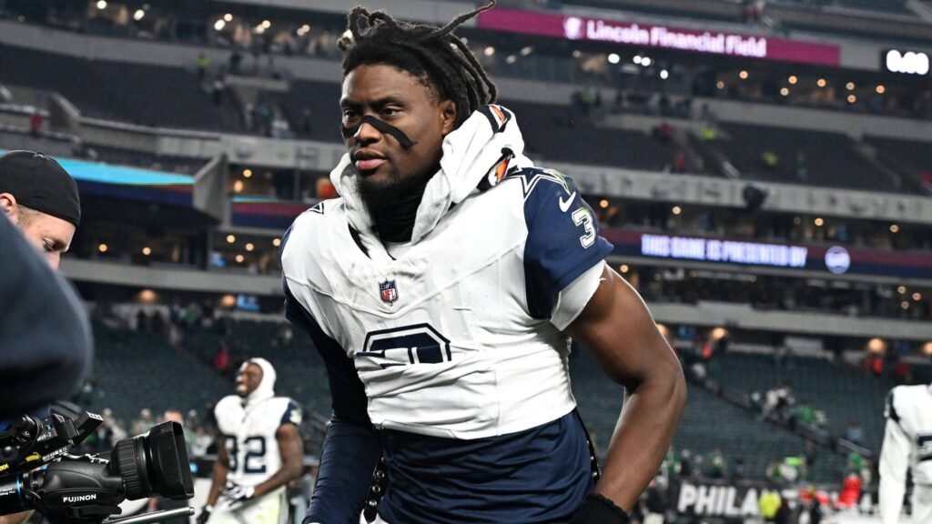 George Pickens leaves the field in a white Dallas Cowboys No.3 jersey.
