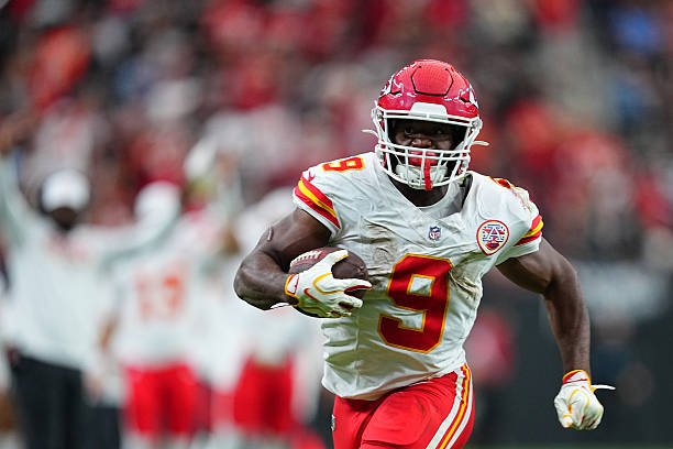 Kenneth Walker scores late against the Raiders