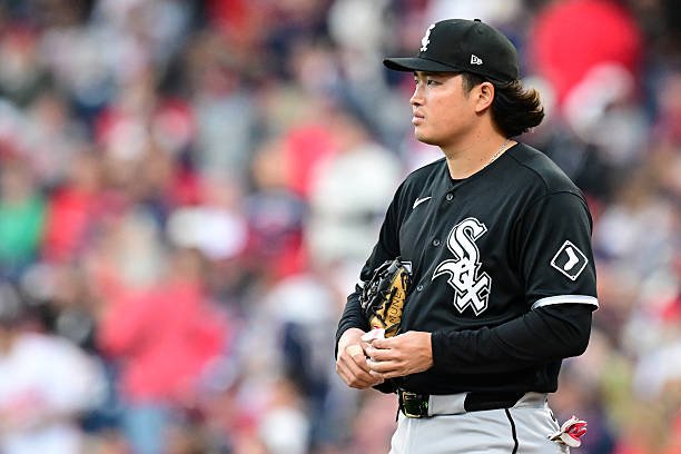 Munetaka Murakami holds his glove during White Sox–Guardians ALDS Game 2 at Progressive Field.