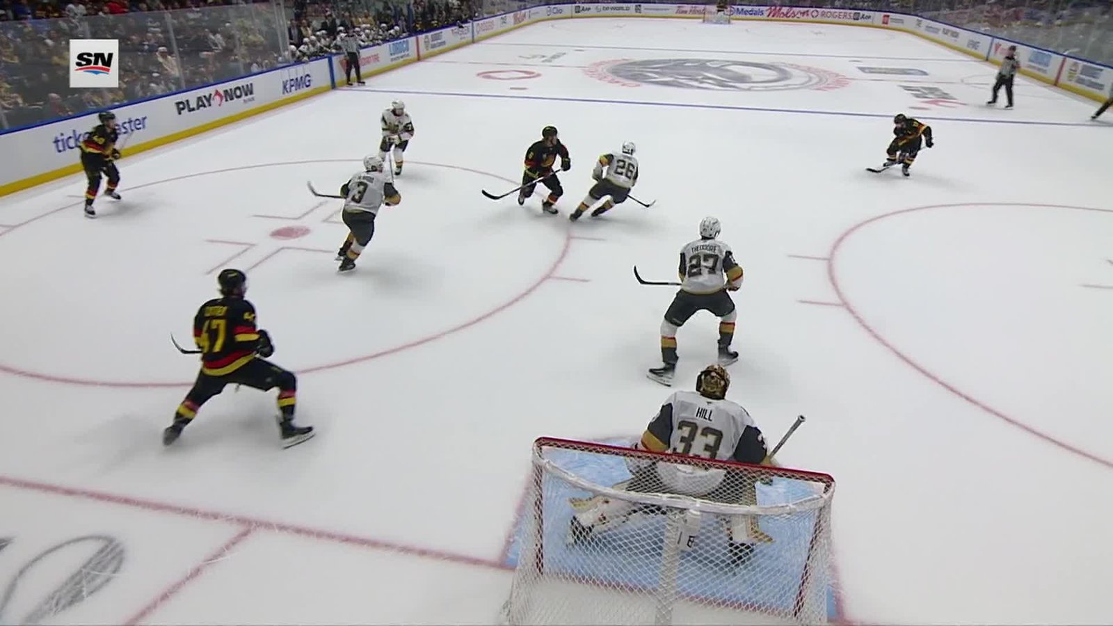 Vancouver attacks Vegas goaltender Adin Hill during the October 4, 2026 Golden Knights–Canucks game.
