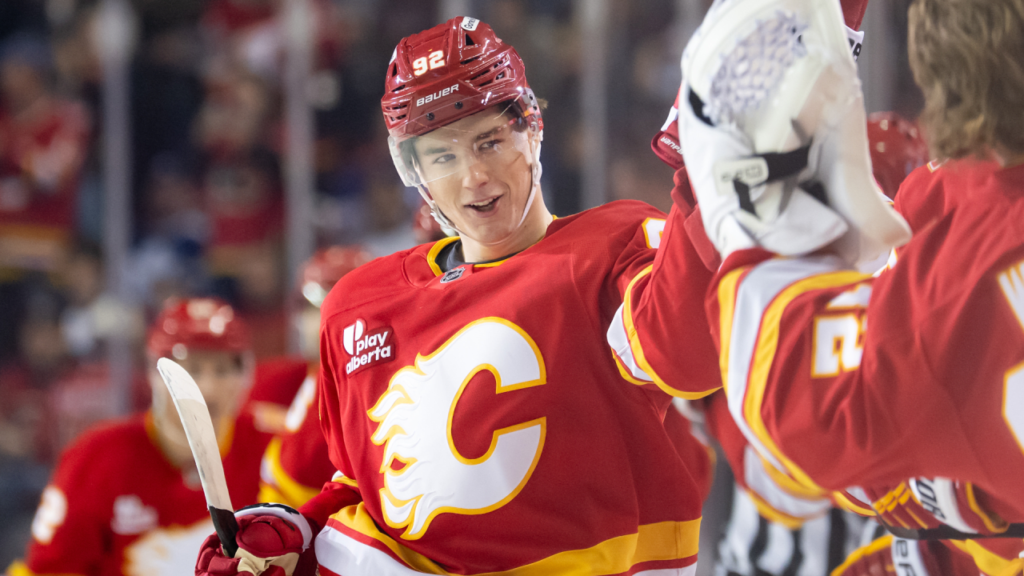 Matvei Gridin, wearing number 92, celebrates with Flames teammates during Calgary’s game against Toronto on October 26, 2026.