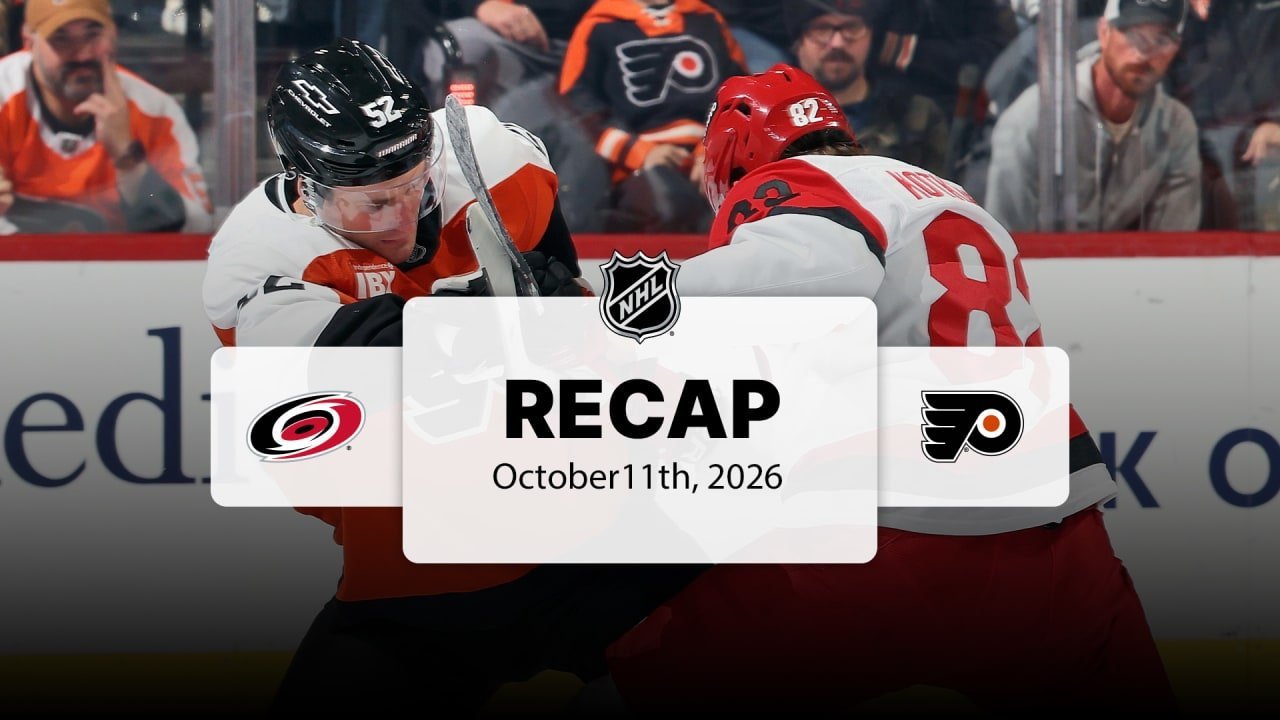 Carolina and Philadelphia players battle along the boards in the official October 11 game-recap thumbnail.