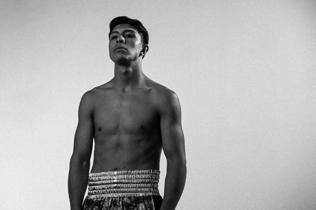Jaime Munguia stands in boxing trunks in an archival photograph from November 18, 2021.