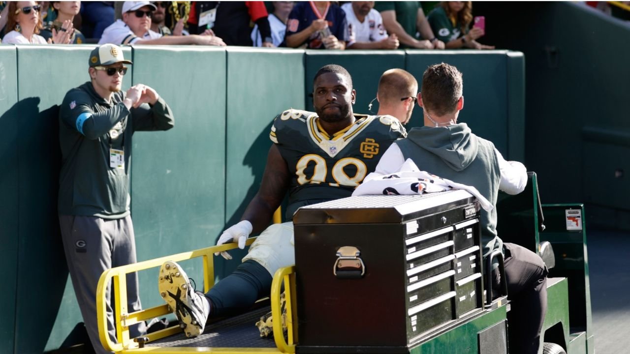 Javon Hargrave on a cart after leaving Green Bay’s game against Chicago.