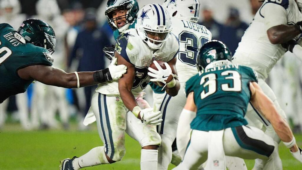 Javonte Williams carries the ball through Philadelphia defenders during Dallas’ Monday night win.