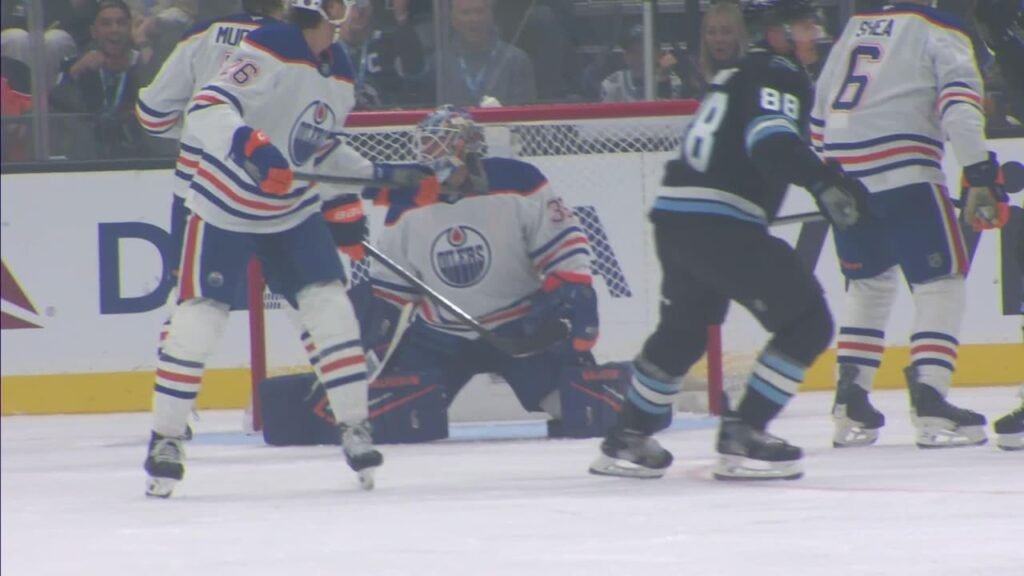 Utah players attack Edmonton’s goal at Delta Center.