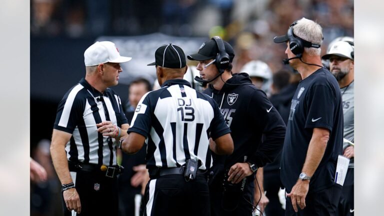 Klint Kubiak with officials during Chiefs&ndash;Raiders at Allegiant Stadium on October 4, 2026.