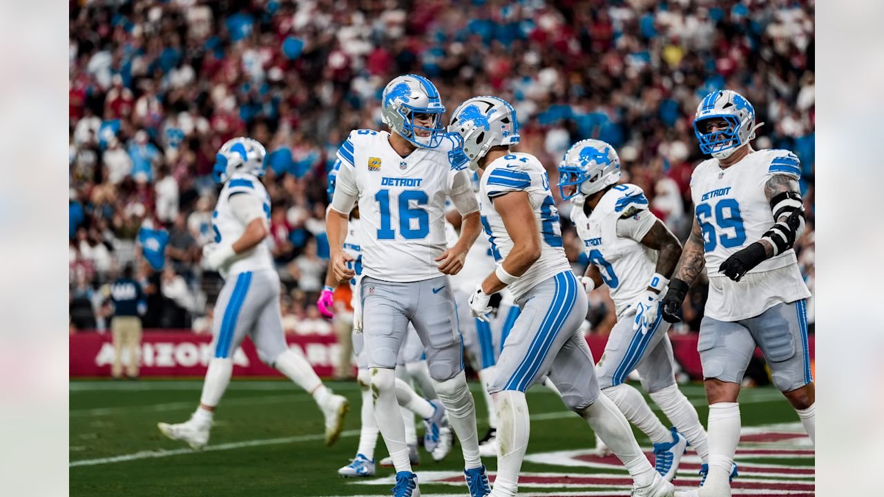 Jared Goff and Sam LaPorta celebrate a Detroit touchdown in white and blue uniforms against Arizona on October 11, 2026.