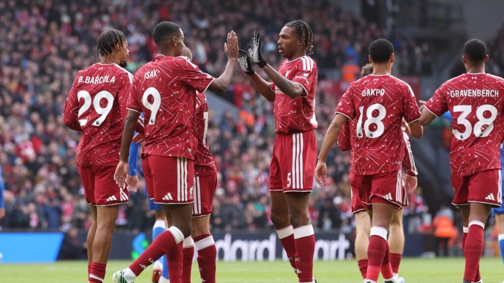 Alexander Isak in Liverpool’s No. 9 shirt celebrates with teammates during the Brighton game at Anfield.