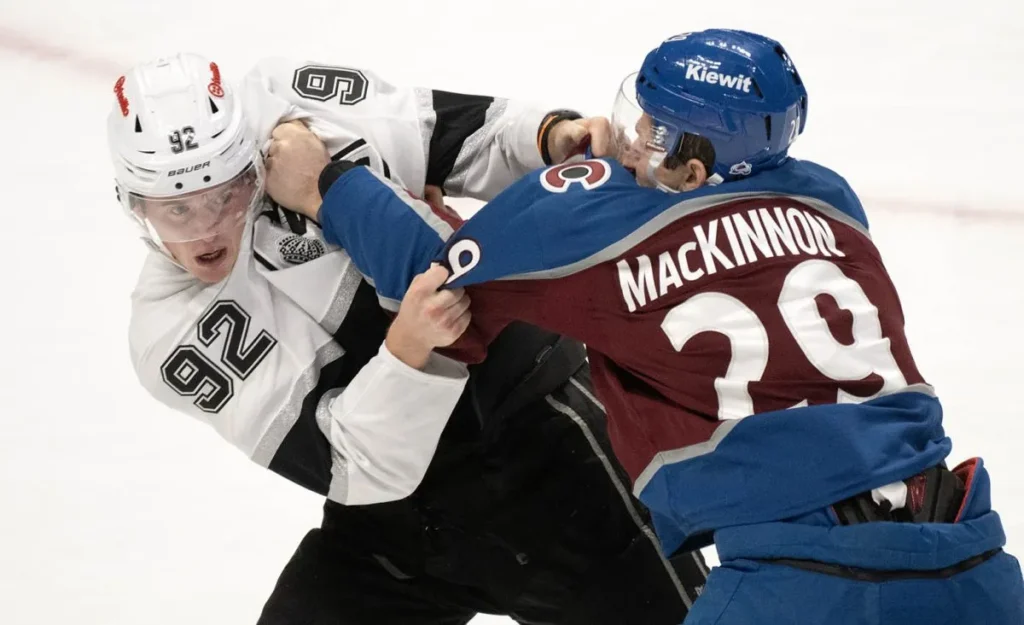Nathan MacKinnon fights Brandt Clarke during the September 30, 2026 Kings–Avalanche game
