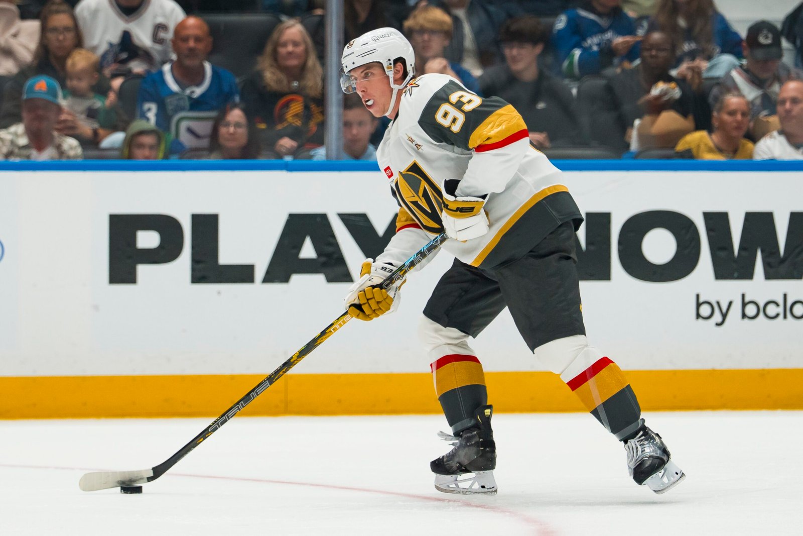 Mitch Marner in Vegas’ white No. 93 uniform skating against Vancouver.
