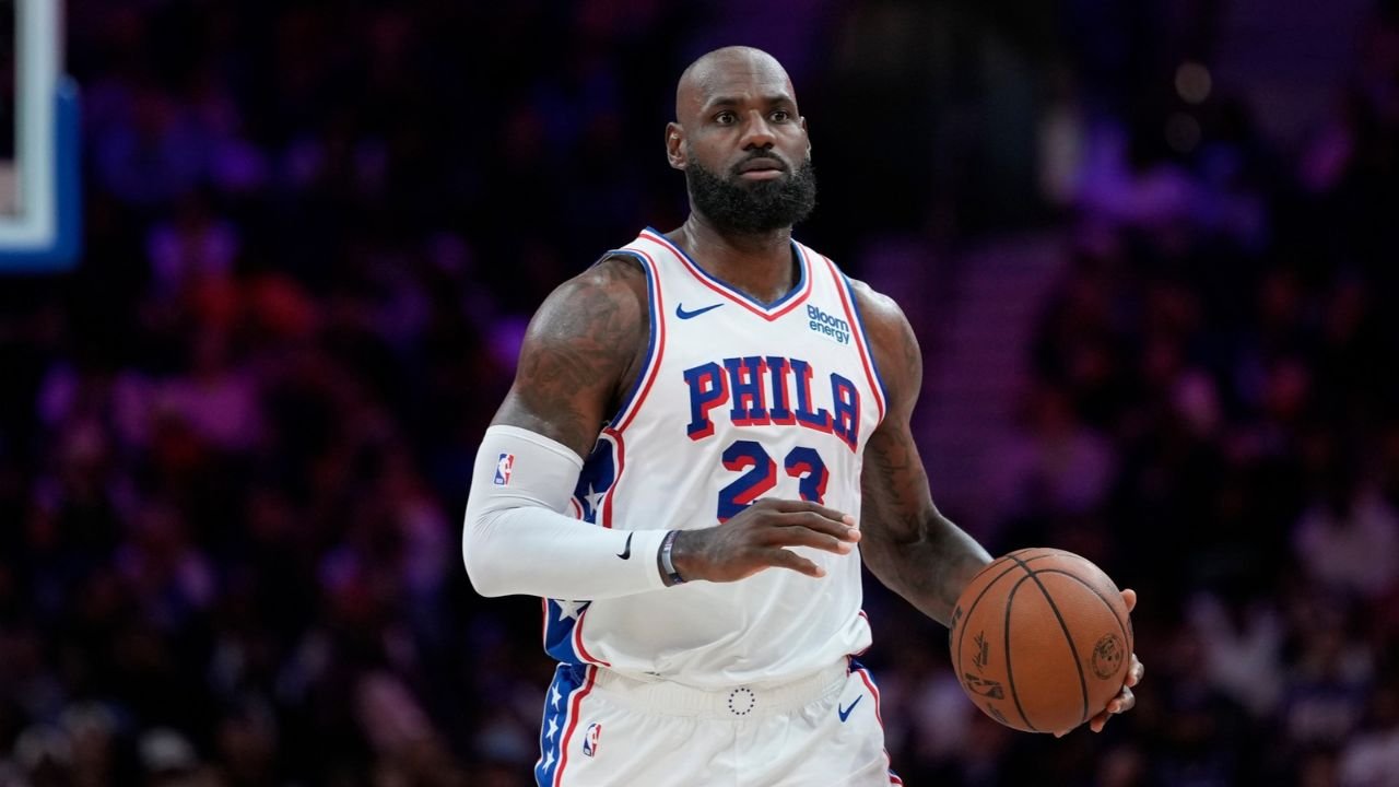 LeBron James handles the ball for Philadelphia during the October 16, 2026 preseason game against Boston.