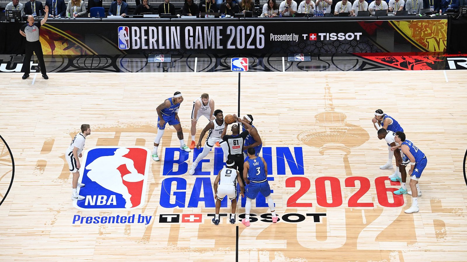 Memphis and Orlando players contest the opening tip at the NBA Berlin Game.