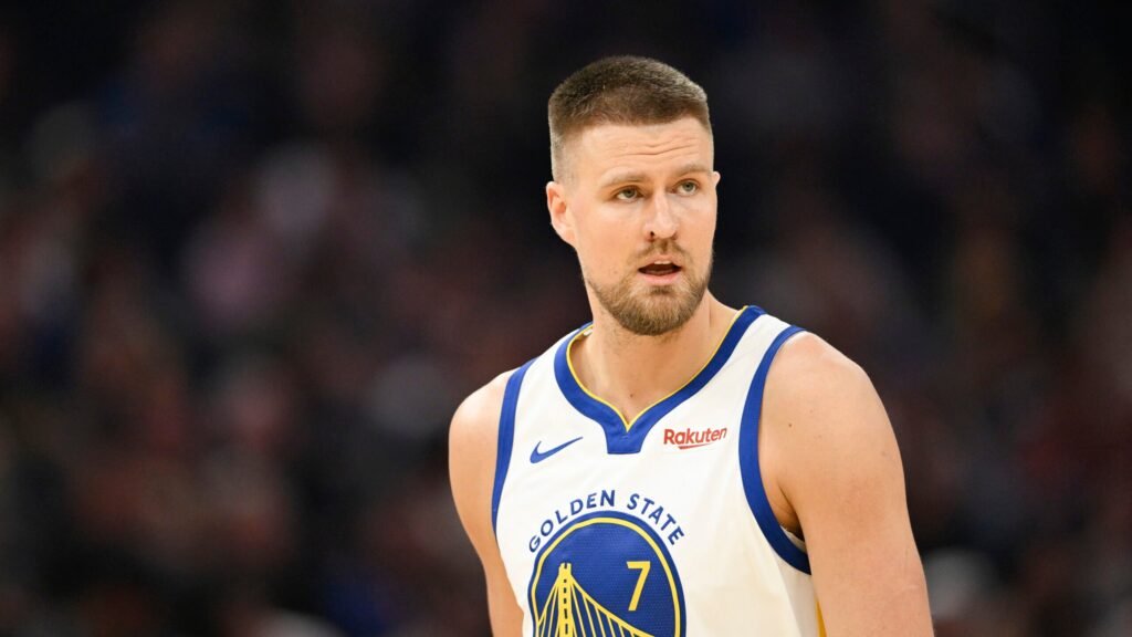Kristaps Porzingis in a Golden State Warriors uniform.