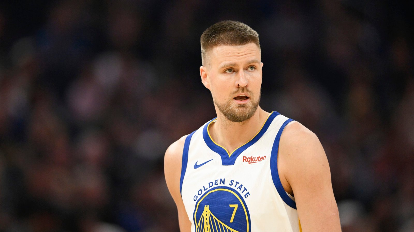 Kristaps Porzingis in a Golden State Warriors uniform.