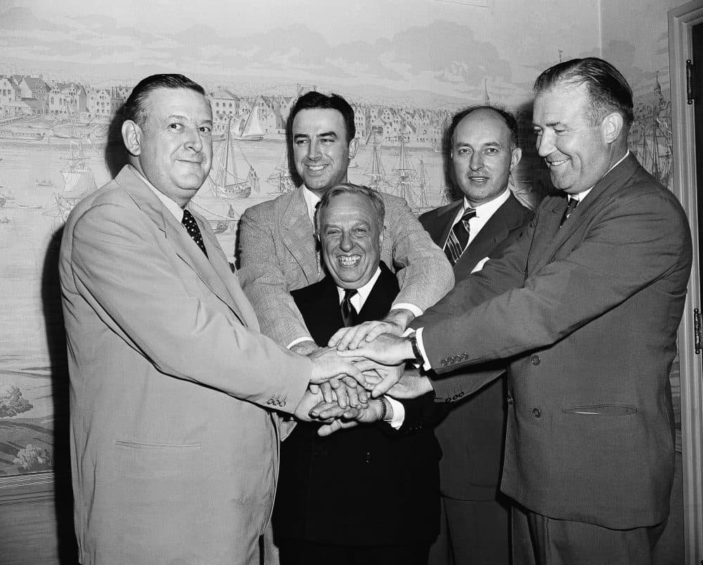 Leo Ferris, second from left, joins representatives of the NBL and BAA after their August 3, 1949, merger agreement.