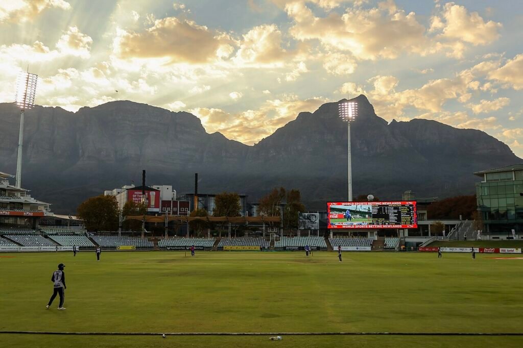 Players on the field at Newlands Cricket Ground in Cape Town during a March 2026 domestic match.