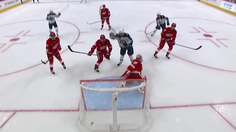 Winnipeg and Detroit players in front of the Red Wings’ net during their October 4, 2026 game.