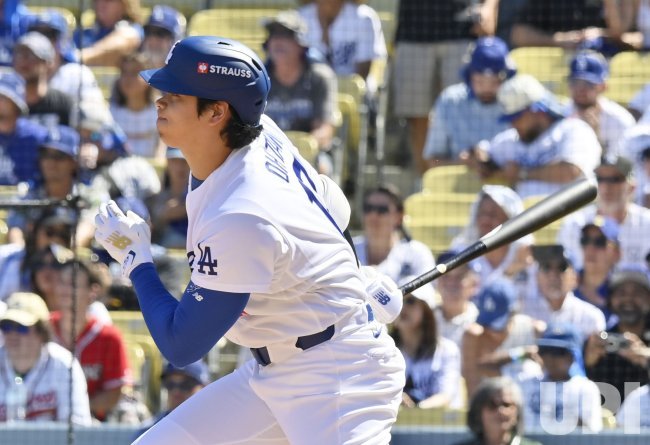 Shohei Ohtani hits a first-inning single against the Atlanta Braves in NLDS Game 1 at Dodger Stadium on October 3, 2026.