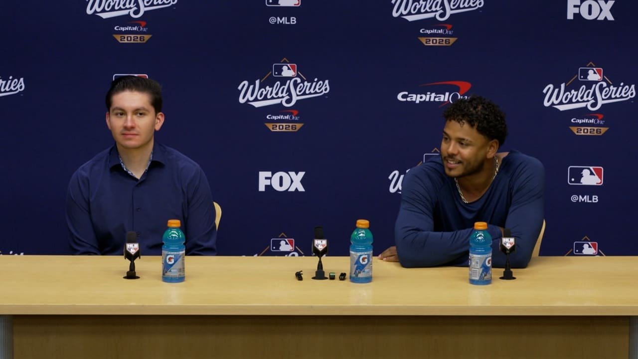 Freddy Peralta, right, speaks at a World Series press conference on October 24, 2026.