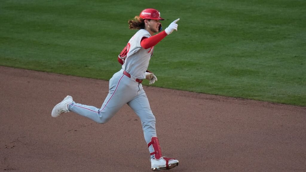 Alec Bohm celebrates his tenth-inning home run in Game 2 against Atlanta on September 30, 2026.