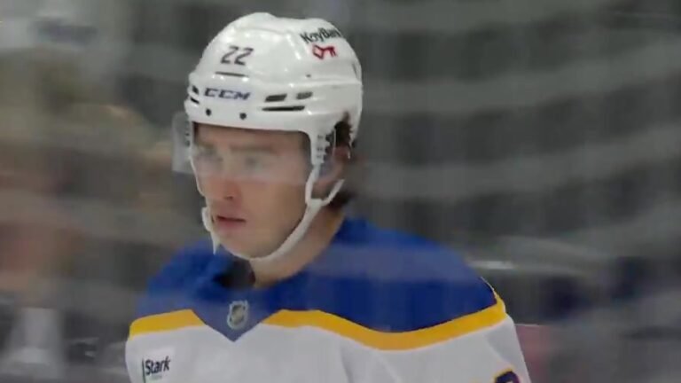 Jack Quinn in Buffalo’s white No. 22 jersey after his second goal against Toronto.