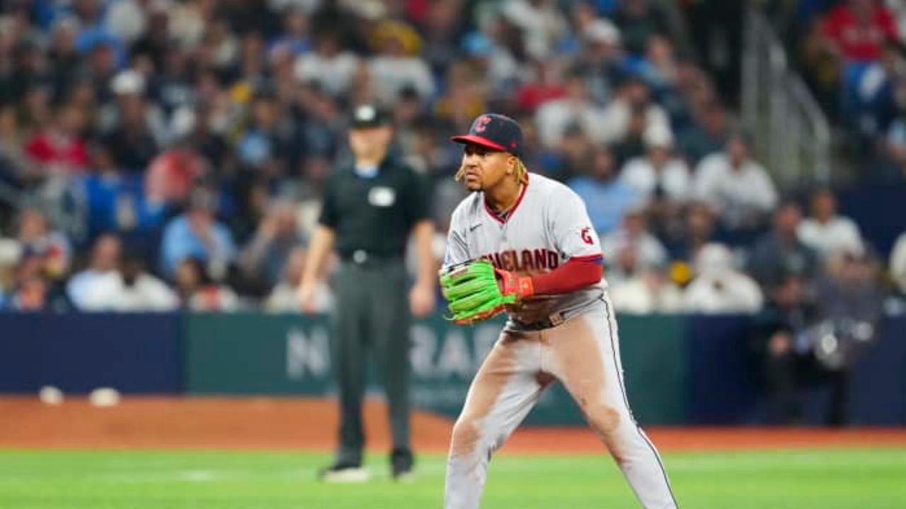 José Ramírez in a Cleveland uniform with his glove at third base.