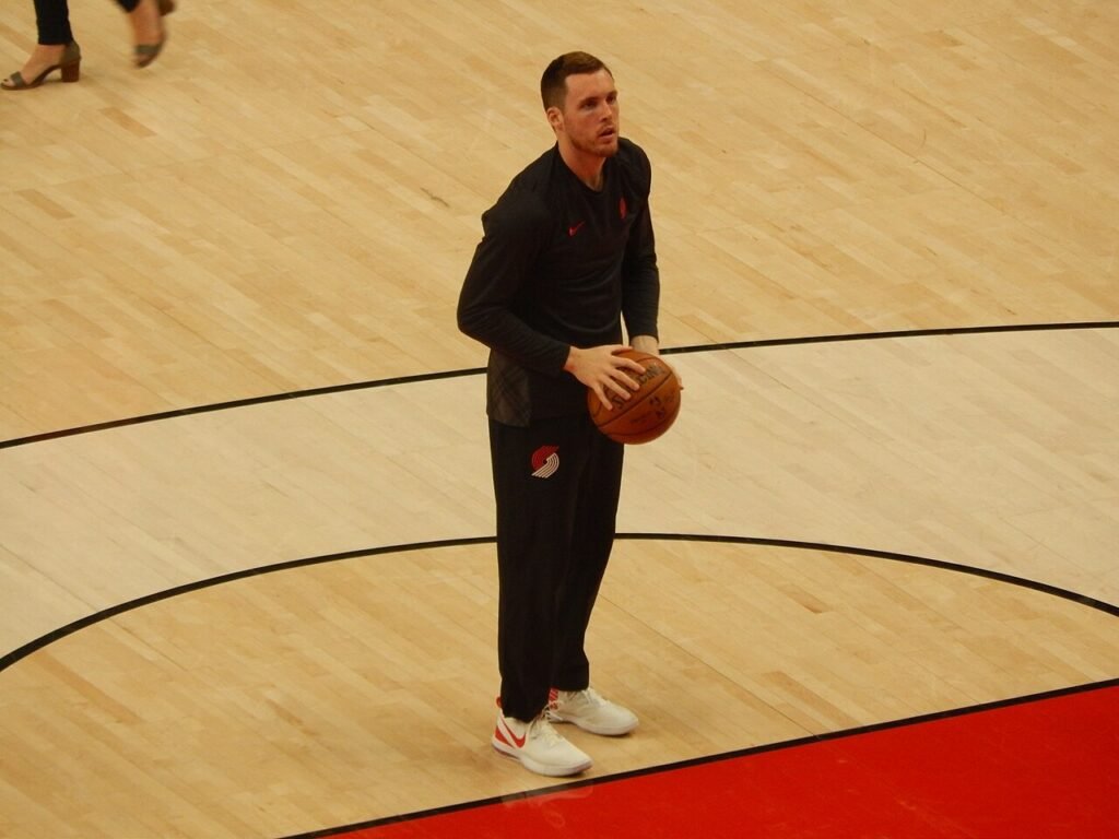 Pat Connaughton wearing Portland Trail Blazers warmup clothing in an archival photograph