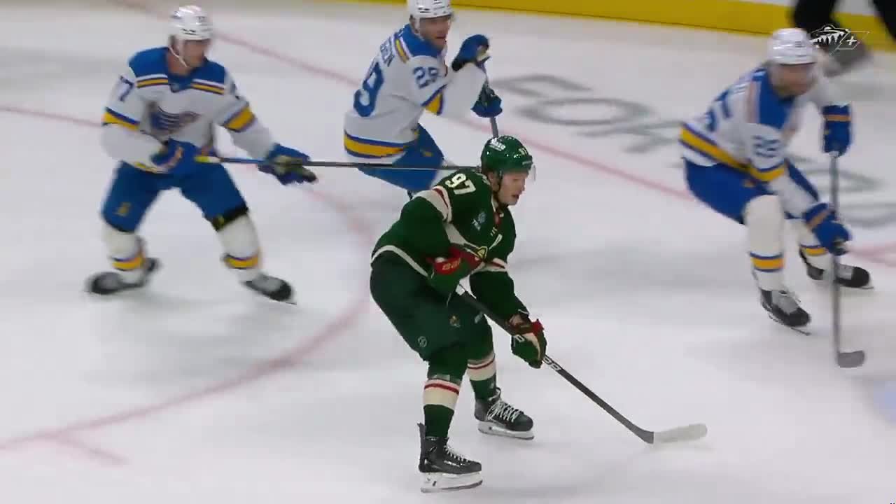 Kirill Kaprizov handles the puck between St. Louis defenders during Minnesota’s win.