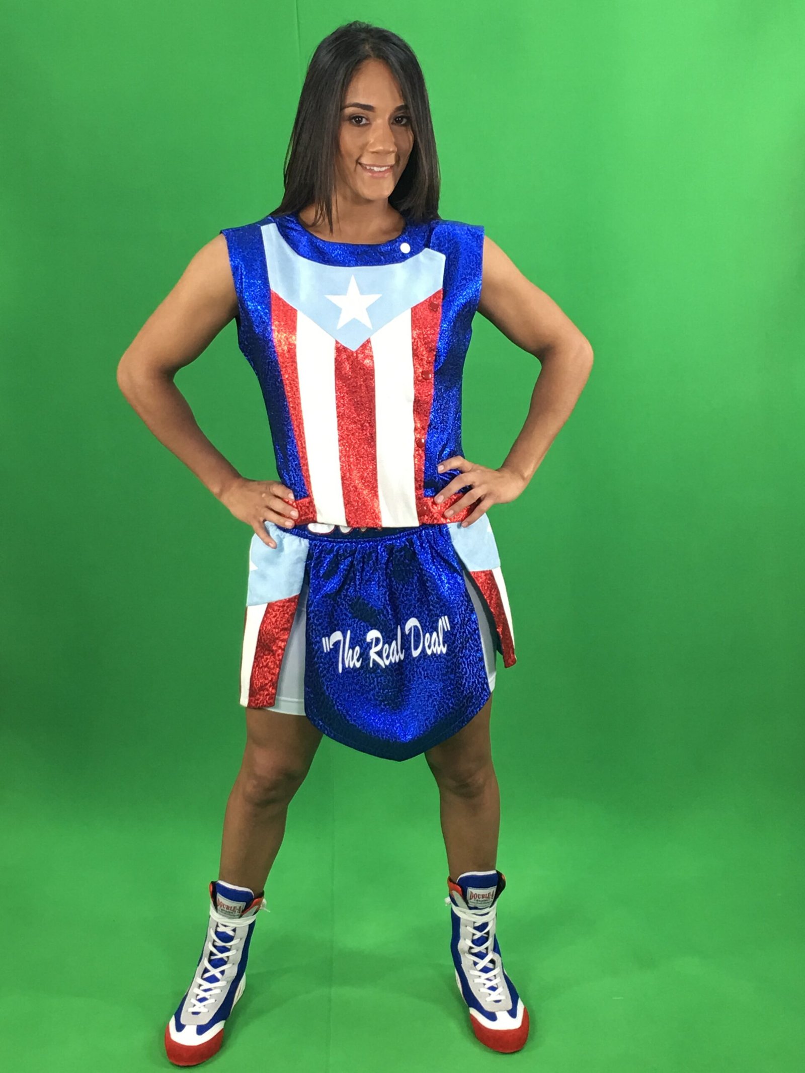 Amanda Serrano in boxing attire with Puerto Rico’s flag colors.