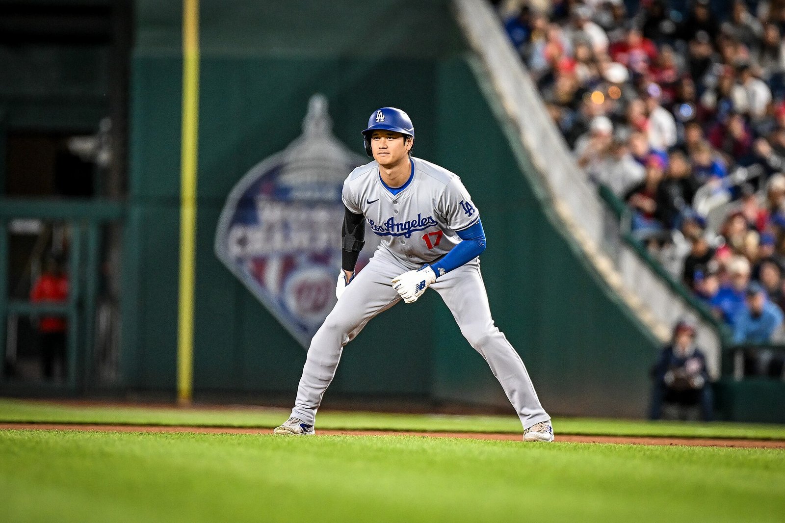 Shohei Ohtani takes a lead on the bases for the Dodgers in Washington in April 2024.