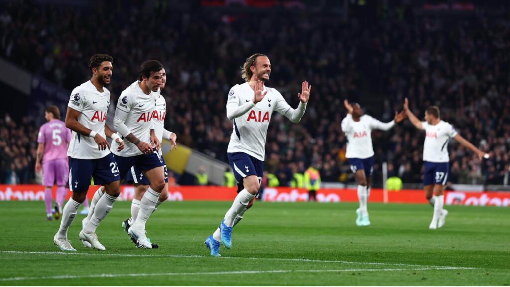 James Maddison celebrates with Tottenham teammates during the Coventry match.