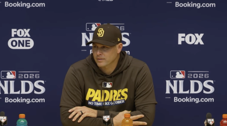 Craig Stammen in a Padres cap and hoodie at his October 4, 2026 postgame news conference