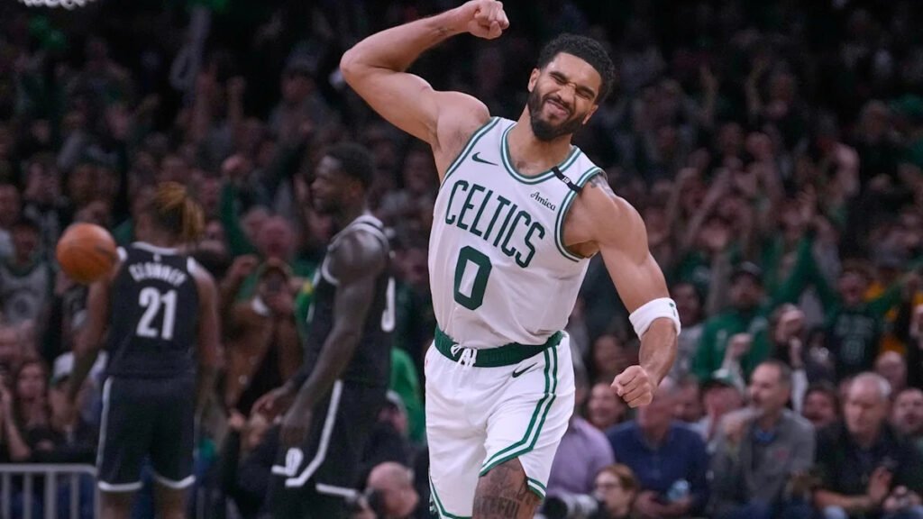 Jayson Tatum in a white Celtics jersey during the October 27 Nets game.