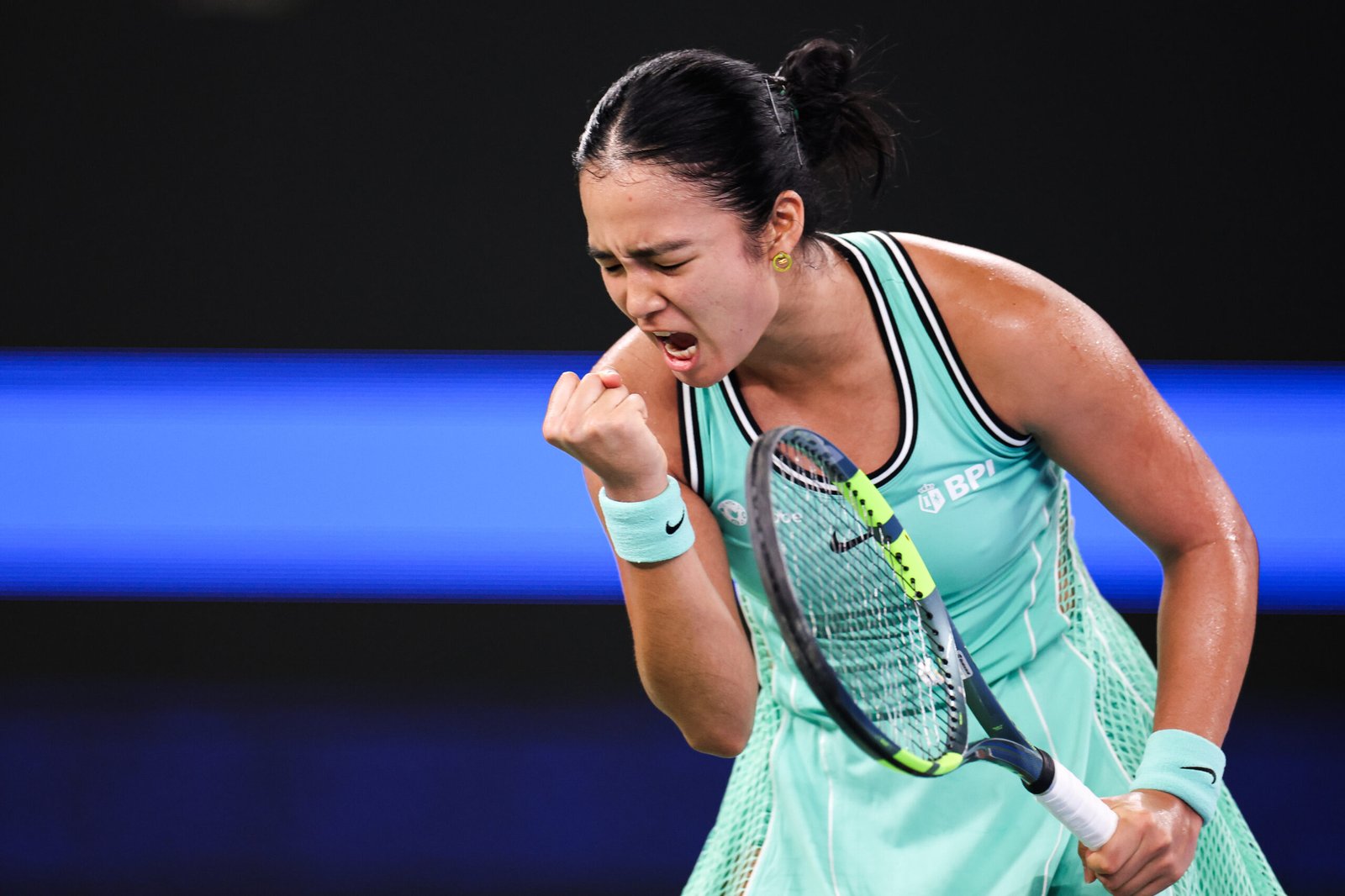 Alexandra Eala raises a fist during her Wuhan Open match on October 12, 2026.