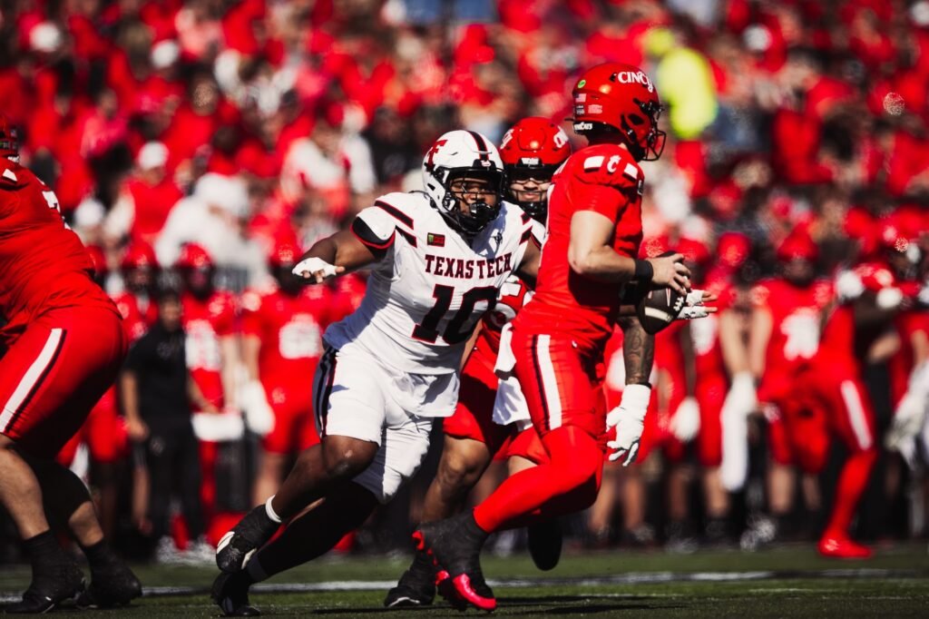 Texas Tech defender A.J. Holmes Jr. pursues Cincinnati’s quarterback during the October 24 game.