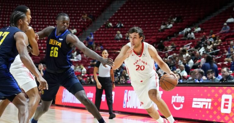 Tyson Degenhart in a white Toronto Raptors jersey handling the ball against Denver.
